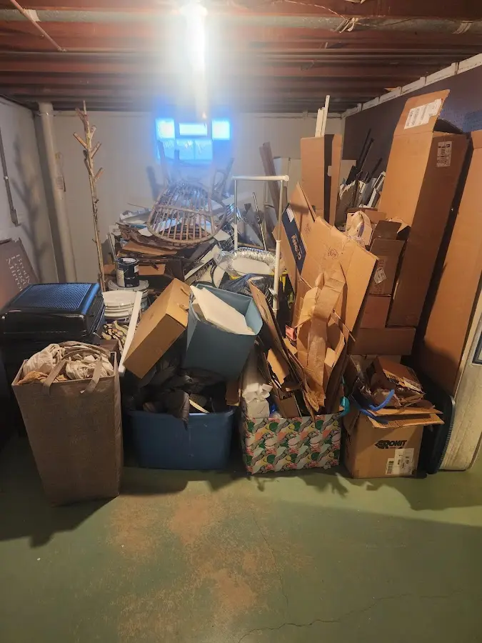 Roll-off dumpster container at job site for Roll Off Dumpster Rental in Union Beach